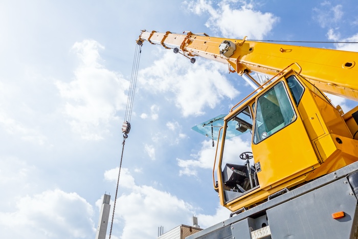 Open door on cabin of mobile crane truck